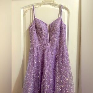 I am selling a lilac prom dress.